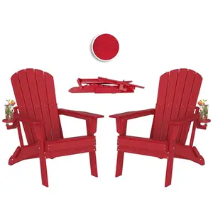 Pair of red folding Adirondack chairs with cup holders on a lakefront deck