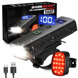 DARKBEAM bike light set with auto sensor headlight and red tail light, showing USB-C charging port