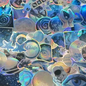 Caakkee holographic glitter space stickers with fantasy planets and stars on a water bottle