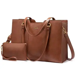 Vintage brown leather laptop tote with gold-tone hardware and matching wristlet