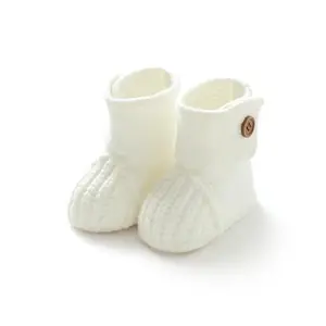 DovFanny soft knit baby booties in white with button closure