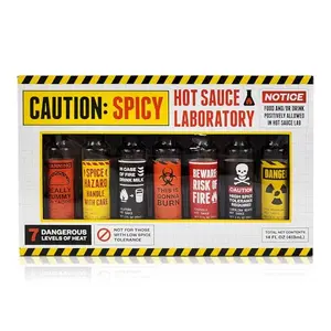 Caution Hot Sauce Laboratory 7-pack with assorted spicy flavors including Carolina Reaper and Habanero