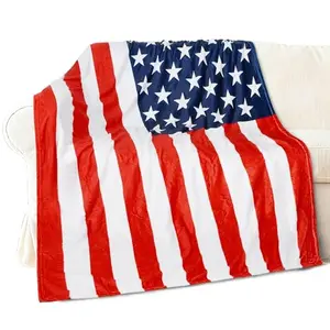 Catalonia USA flag fleece blanket folded on a couch