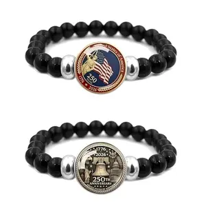 Two adjustable black bead bracelets from Gmbkouo with crystal flag pendants, laid out on a festive red background.