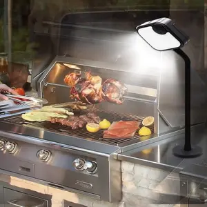 IriQuart grill light with flexible gooseneck illuminating a grill grate