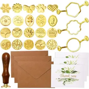 Generic wax seal stamp kit with multiple stamp heads, wooden handle, molds, and kraft envelopes