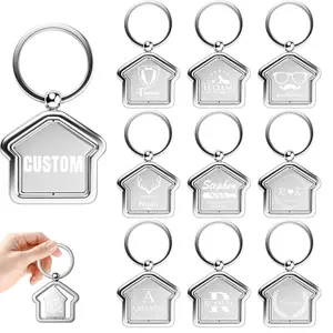 Customizable rotating house-shaped metal keychains for real estate agents, can be engraved with logo