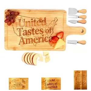 United Tastes of America engraved bamboo cheese board with four cheese knives on rustic wood table