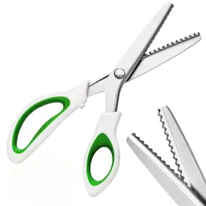 VPQZUPG green pinking shears cutting pink fabric
