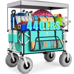 Navatiee beach wagon with canopy and balloon wheels on sand
