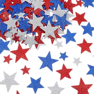 Red, white, and blue foam star stickers on a white background with a craft project