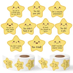 Gold star stickers with funny phrases on a roll