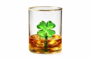 MONARCH CRYSTAL 4 leaf clover whiskey glass with gold rim and green clover inside