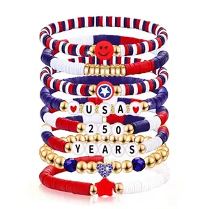 Hand wearing red, white, and blue clay beaded bracelet with 250 years charm