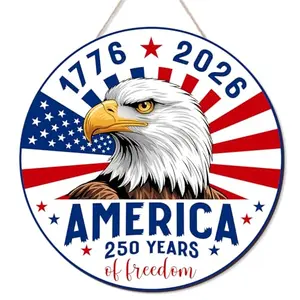 Aymolas 250th anniversary wooden eagle wreath sign with 1776-2026 and 250 Years of Freedom text hanging on a front door