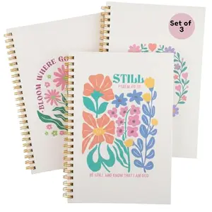 Highmark Collective set of three floral Christian journals with gold spiral binding