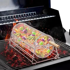 Cylindrical stainless steel grill basket on a rotating stand with wooden handles