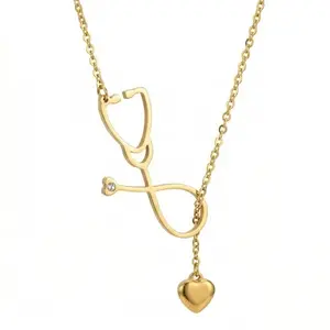 Kings Outlet stethoscope heart necklace in yellow gold plating