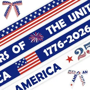 Four rolls of 250th anniversary grosgrain ribbon with flag, star, dot, and text patterns