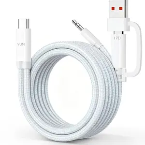 White VUM USB-C to 3.5mm aux cable with cotton braiding and silver-plated connectors