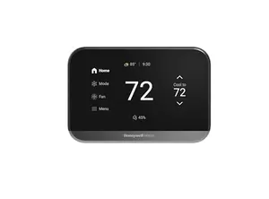 Black Honeywell X7S Smart Thermostat on a wall