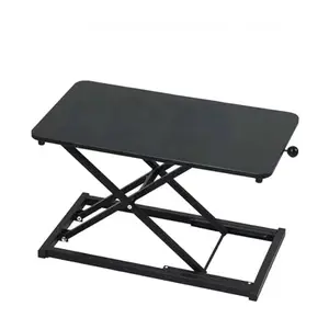 Raathionty compact black desk riser with X-lift structure on a small desk
