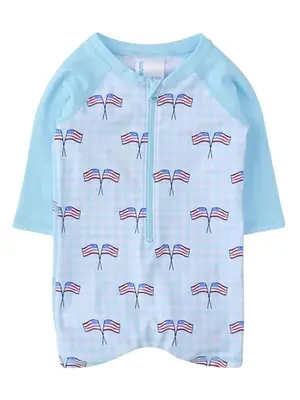 Baby boy wearing blue patriotic gingham rash guard swimsuit